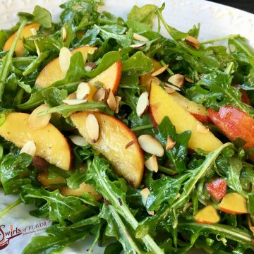 Peach Arugula Salad With Basil Mint Vinaigrette is an easy salad recipe bursting with the summer flavors of juicy peaches, fragrant basil and fresh mint!