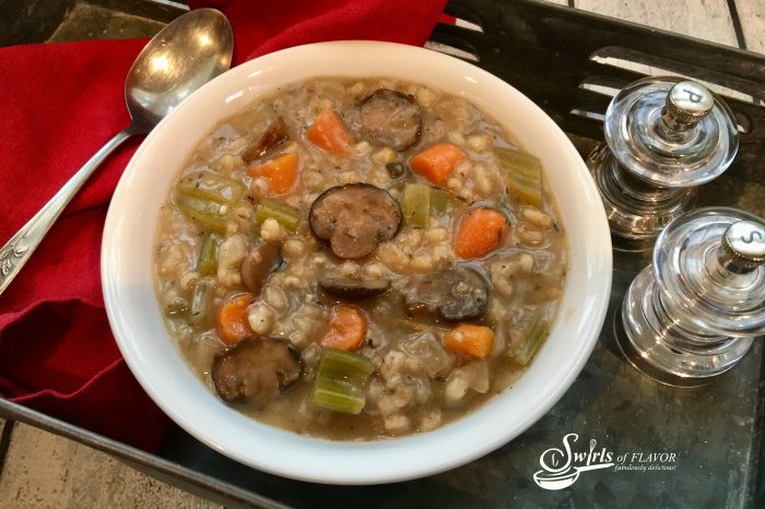 Slow Cooker Mushroom Barley Soup is bursting with tender mushrooms, carrots, celery and onions complimented by bits of barley in a perfectly seasoned broth. soup | slow cooker | crockpot | mushroom | barley | vegetable | dinner