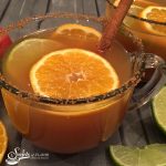 Mulled Apple Cider warms in your slow cooker, combining apple cider with cinnamon sticks, fresh ginger and clementines, will fill your home with "Swirls of Flavor"! Add Bourbon and sipping on Mulled Apple Cider will be a perfect way to kick off your holiday gathering. #Bourbon #applecider #mulledcider #warmdrinks #hottoddy #clementines #easy recipe #holiday #appleseason #swirlsofflavor