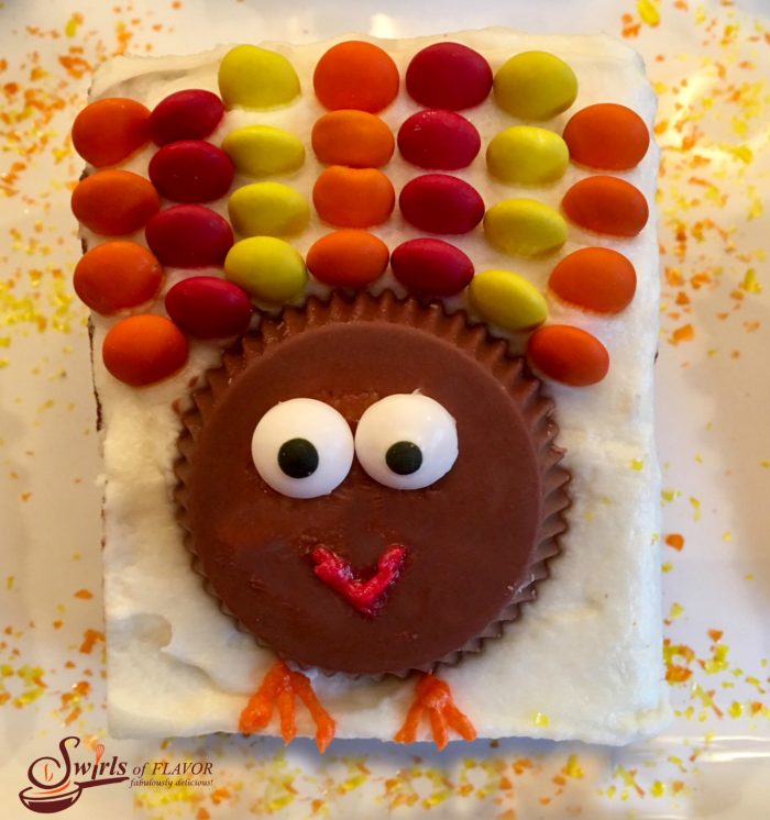 Turkey Brownies are an easy recipe for a rich fudgy homemade brownie topped with a creamy vanilla buttercream and turkeys made of candy! So much fun to make and eat! Turkey Brownies are guaranteed to become a holiday tradition!Â #homemadebrownies #candyturkeys #turkeybrownies #dessert #easy recipe #funforkids #holiday #Thanksgiving #swirlsofflavor