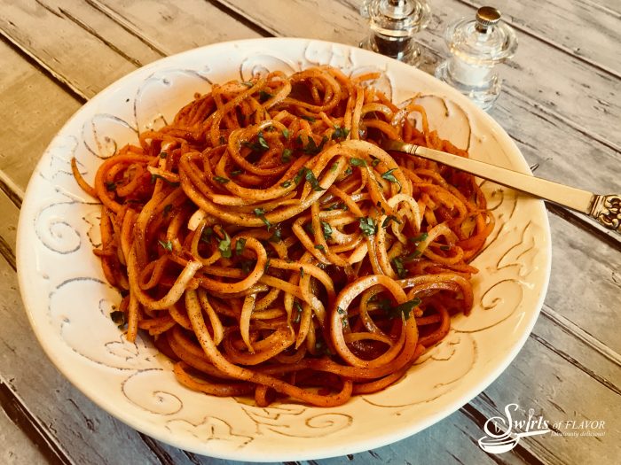 Brown Sugar Cinnamon Sweet Potato Noodles, an updated trendy version of the steakhouse favorite, are spiralized noodles coated in a buttery sauce with a hint of spice! Fun and fancy and perfect for your holiday table! sweet potato noodles | spiralized noodles | baked sweet potato | brown sugar cinnamon butter