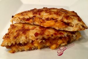 Cauliflower Grilled Cheese With Fig Jam & Cheddar starts with cauliflower bread and is brimming with melty cheddar cheese and warm sweet fig jam.