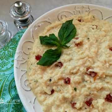 partial bowl of cauliflower risotto with sundried tomatoes