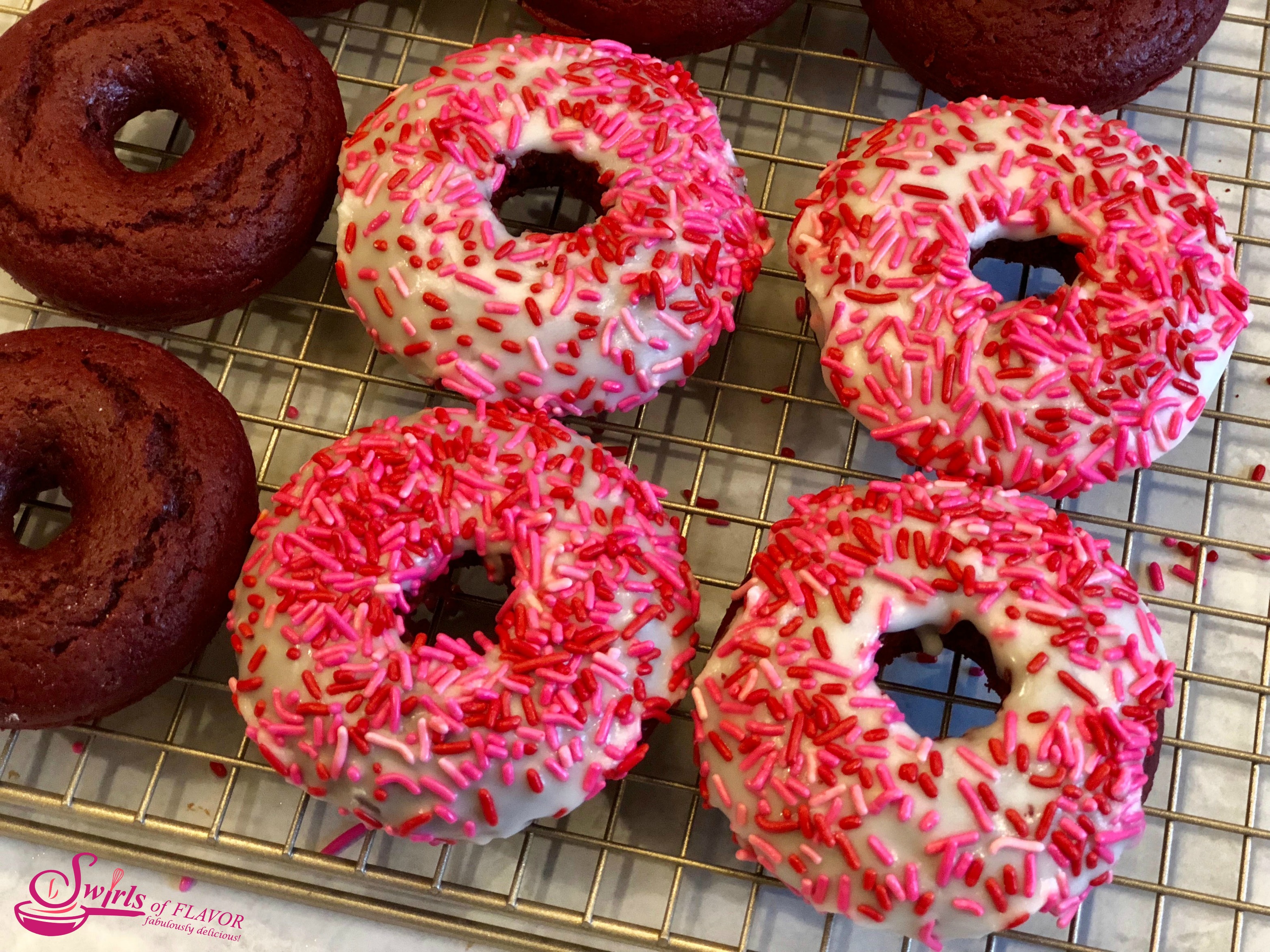 Baked Red velvet donuts with frosting and sprinkles 