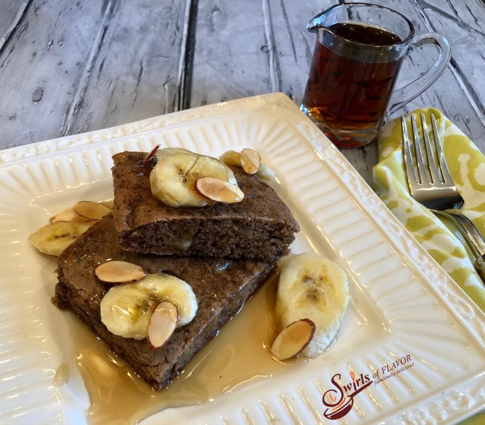 Sheet Pan Banana Bread Pancakes make mornings easier and oh so delicious! Brown sugar, cinnamon and bananas bake in a pancake batter in just minutes! sheet pan | breakfast | banana bread | easy | fun for kids