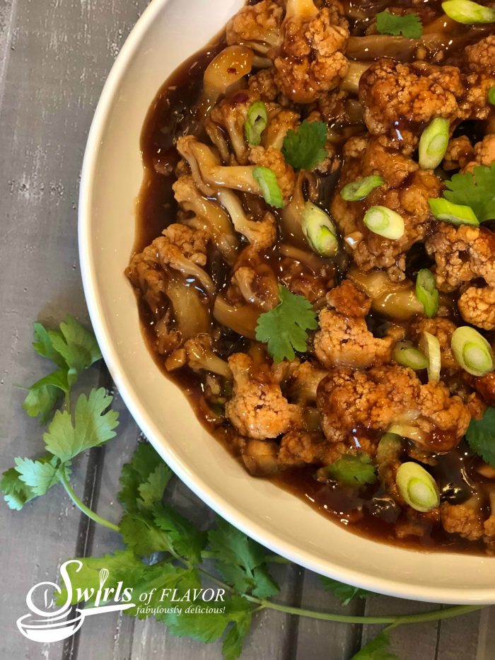 General Tso's Cauliflower will replace your Chinese take out! A silky sauce seasoned with fresh ginger, garlic and red pepper flakes, for just a touch of heat, surrounds tender cauliflower for the perfect meatless meal. Meatless Monday | vegetarian | Chinese | recipe | easy | dinner | side dish | vegetable