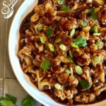 General Tso's Cauliflower will replace your Chinese take out! A silky sauce seasoned with fresh ginger, garlic and red pepper flakes, for just a touch of heat, surrounds tender cauliflower for the perfect meatless meal. #MeatlessMonday #vegetarian #Chinese #recipe #easyrecipe #dinner #sidedish #vegetable #swirlsofflavor