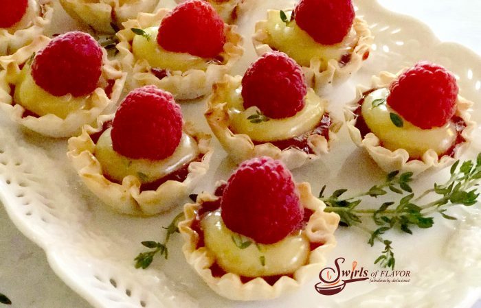 No-Bake Raspberry Lemon Thyme Tartlets are a 5 ingredient quick and easy dessert that's bursting with spring flavors and fruity sweetness!