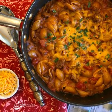 chili mac and cheese in a skillet