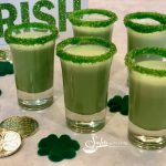 Shamrock Shake Shooters, made with vanilla ice cream, Irish Whiskey, mint flavoring and tinted green, are sure to be the hit of your Saint Patrick's Day!