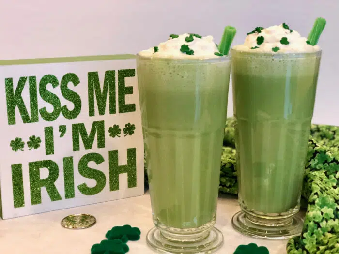 green shamrock shakes with whipped cream and sprinkles