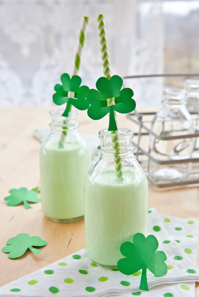 green shakes in bottles with straws