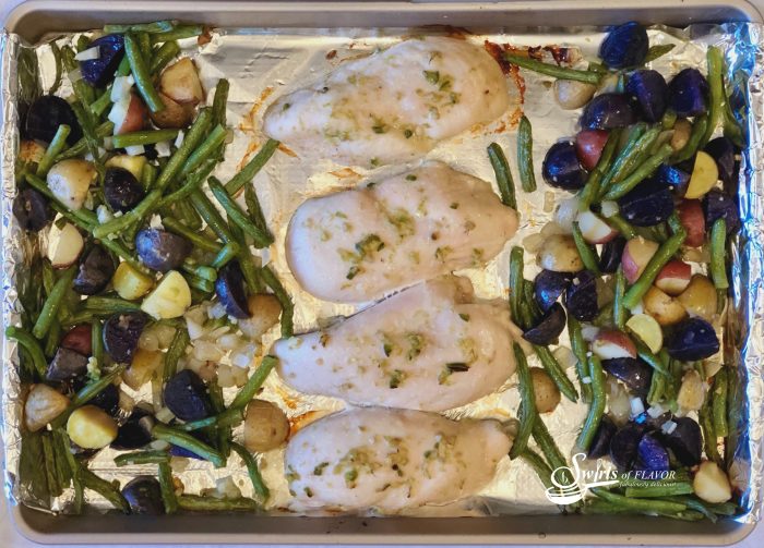 Sheet Pan Jalapeno Lime chicken Dinner is an easy recipe that cooks together in the oven. chicken, potatoes and green beans are flavored with zesty jalapeno and fresh lime! easy dinner | easy recipe | sheet pan | chicken | potatoes | vegetables | green beans | #swirlsofflavor
