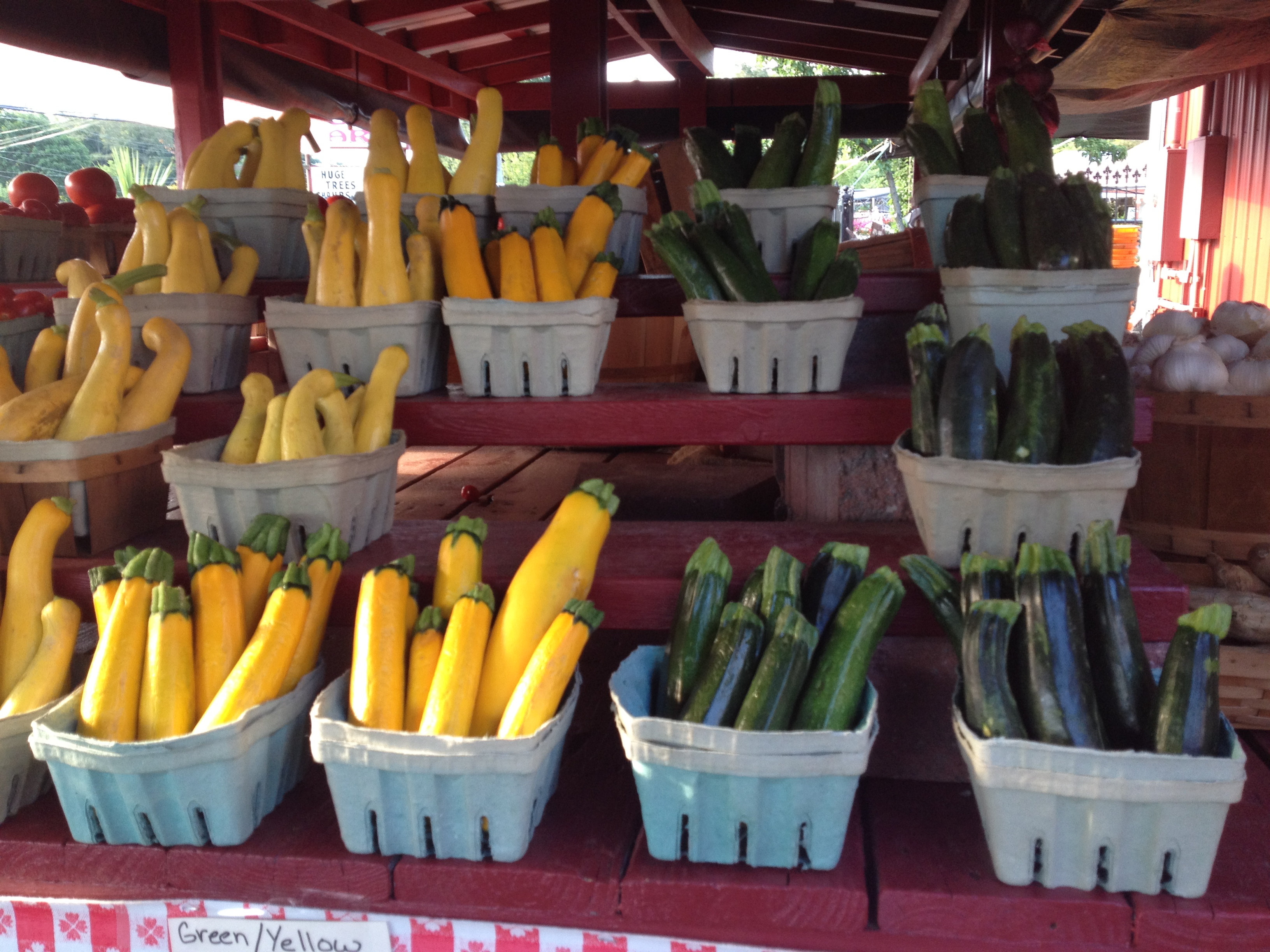 Zucchini and yellow squash at a farmstand