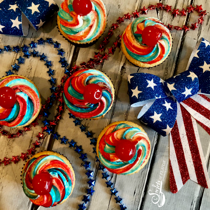Celebrate our country's birthday with homemade vanilla July 4th Cupcakes with red white and blue frosting and a cherry on top!