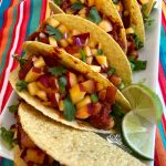 Vegan Chickpea Tacos With Peach Salsa is an easy vegan recipe that's packed with the protein of chickpeas and topped with a lime-scented fresh peach salsa! tacos | Taco Tuesday | chickpeas | tomatoes | peaches | salsa | fruit salsa | summer recipe | #swirlsofflavor