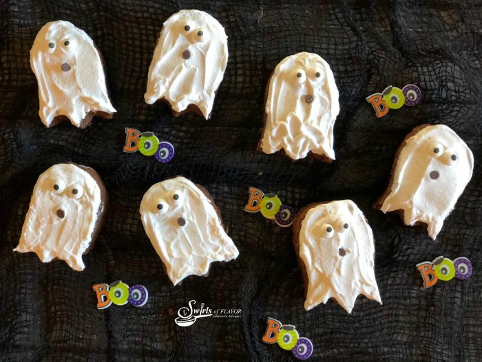 Halloween Ghost Brownies will be a spooky addition to your Halloween festivities! An easy recipe for homemade brownies with a whipped topping and sugar eyes, these Halloween brownies will be a ghostlyÂ sweet treat for everyone. #easyrecipe #brownies #homemadebrownies #Halloweendessert #Halloweenbrownies #ghostbrownies #onebowlbrownies #swirlsofflavor