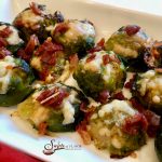 Smashed Brussels Sprouts With Crispy Prosciutto will be your new go-to side dish recipe for special occasions! Smashed sprouts are roasted with two cheeses and then topped with crispy prosciutto for the ultimate side dish! #brusselssprouts #smashedbrusselssprouts #roastedvegetables #prosciutto #holiday #entertaining #Thanksgiving #Christmas #easyrecipe #swirlsofflavor
