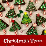 Christmas Tree Brownies is an easy homemade brownie recipe that's a merry holiday treat. Simply cut brownies into triangles and decorate with a homemade buttercream frosting, candy canes, candy, sprinkles and edible glitter! Make Christmas even more fun and festive with Christmas Tree Brownies! #brownies #homemade #baking #holiday #Christmas #funforkids #Christmastrees #candycanes #swirlsofflavor