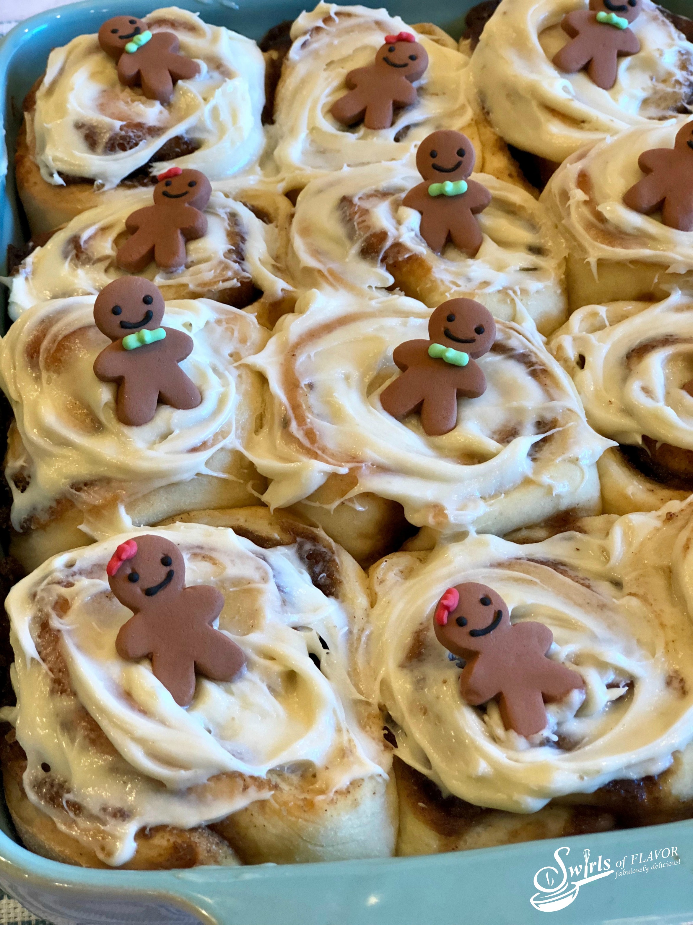 Gingerbread Cinnamon Rolls in a blue casserole dish