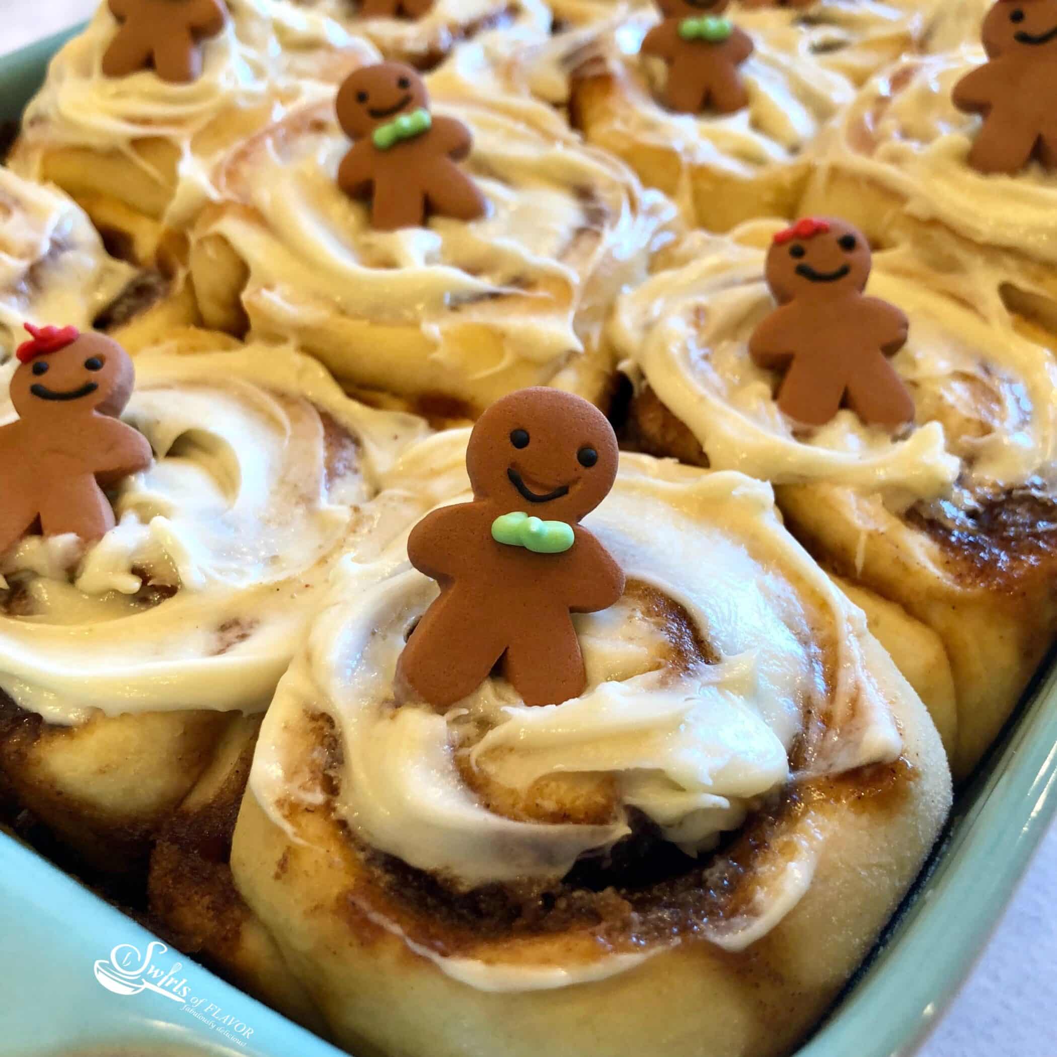 Christmas morning and Gingerbread Cinnamon Rolls go hand in hand. Gingerbread Cinnamon Rolls is an easy recipe filled with gingerbread spices and brown sugar and topped with a silky cream cheese glaze. #cinnamonrolls #cinnamonbuns #gingerbread #breakfast #brunch #Christmas #holiday #entertaining #easyrecipe #overnight #Makeahead #baking #swirlsofflavor