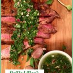 Grilled steak with a frresh herb sauce on a wooden board