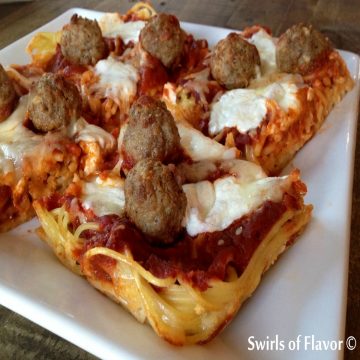 pieces of spaghetti and meatballs pizza