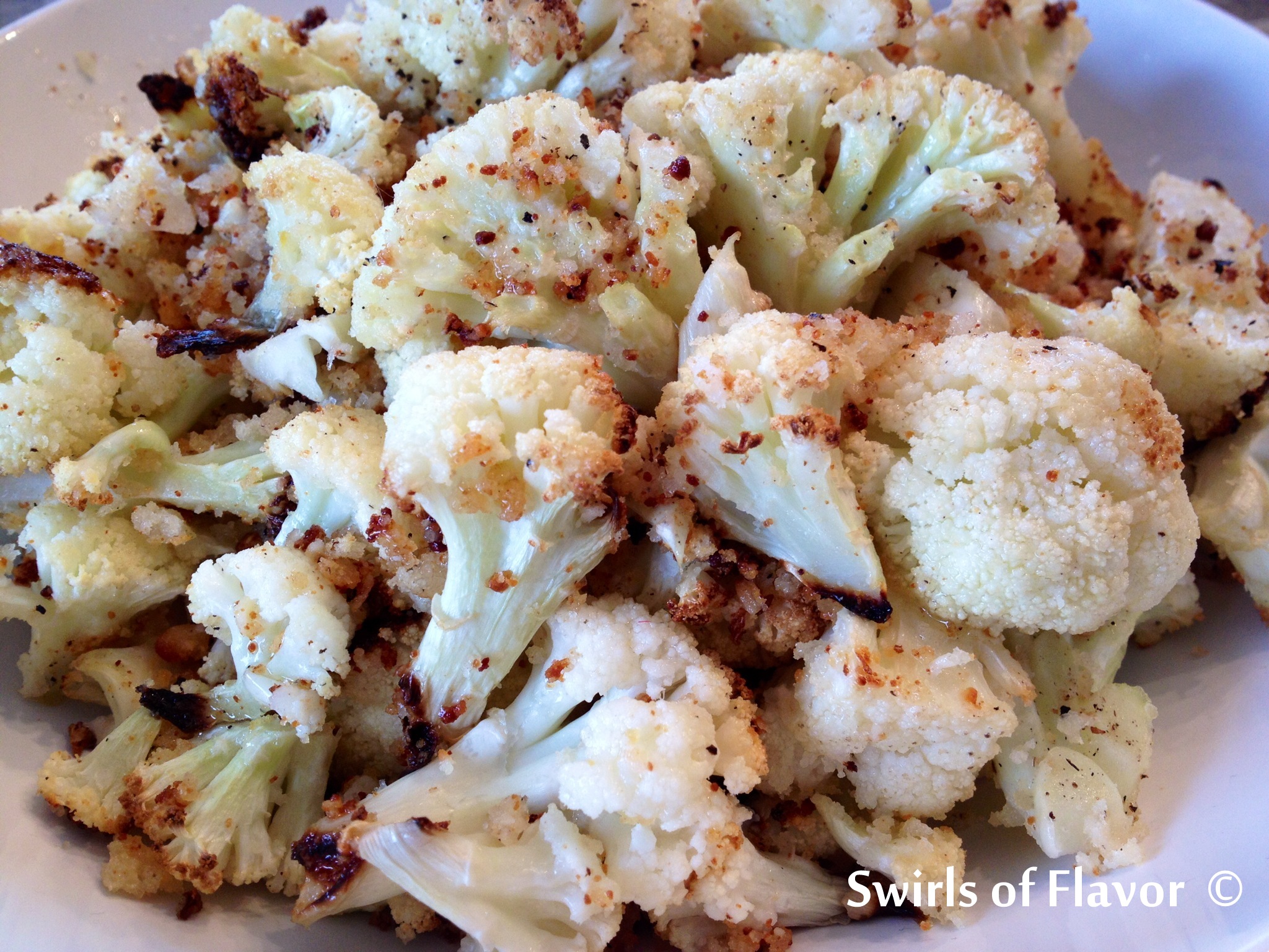 Oven-roasted cauliflower is cooked to perfection with cheesy goodness that melts into all the nooks and crannies. Studded with bits of crispy turkey bacon and scallions, Loaded Baked Cauliflower Casserole really is the healthy alternative to the classic loaded baked potato that you've been looking for!