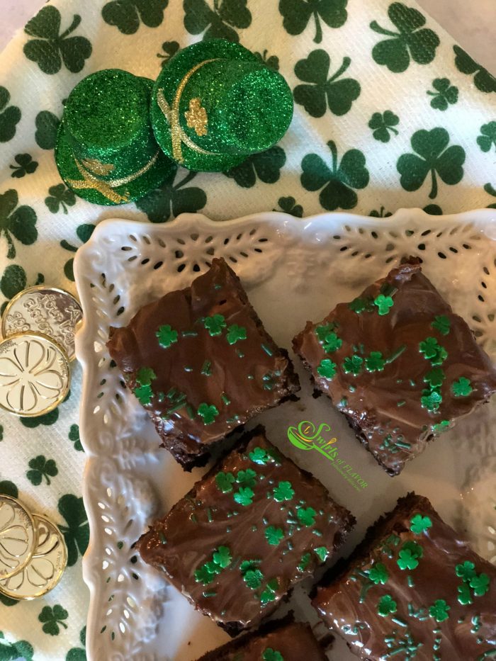 Homemade Chocolate Chip Mint Brownies, topped with a one ingredient mint frosting, is an easy dessert recipe for your Saint Patrick's Day celebration!