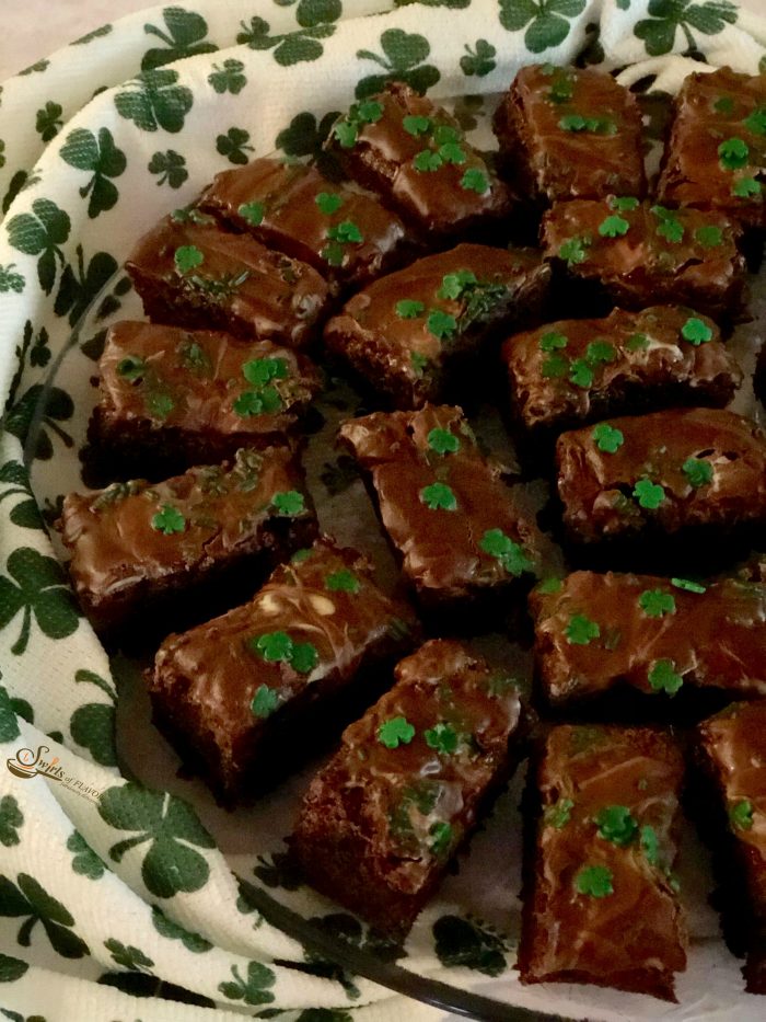 Homemade Chocolate Chip Mint Brownies, topped with a one ingredient mint frosting, is an easy dessert recipe for your Saint Patrick's Day celebration!