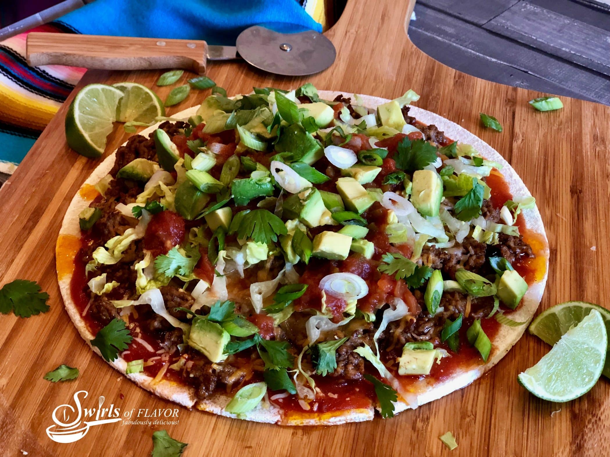 Taco Pizza With Cauliflower Crust puts a delicious twist on Taco Tuesday! Our pizza has all the fillings of a taco on a healthy cauliflower crust for a fun taco dinner that will quickly become a family favorite.