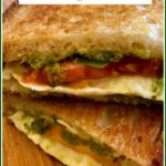 Grilled cheese sandwich with mozzarella, tomato and pesto