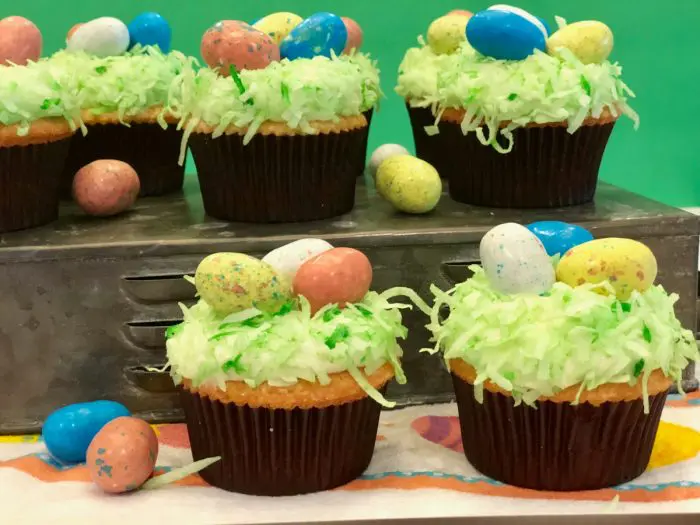 coconut cupcakes topped with malted egg candy