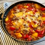 Ground beef, rice, bell peppers and seasonings cook together in one pot in less than 30 minutes in our One Pot Unstuffed Peppers With Rice recipe.