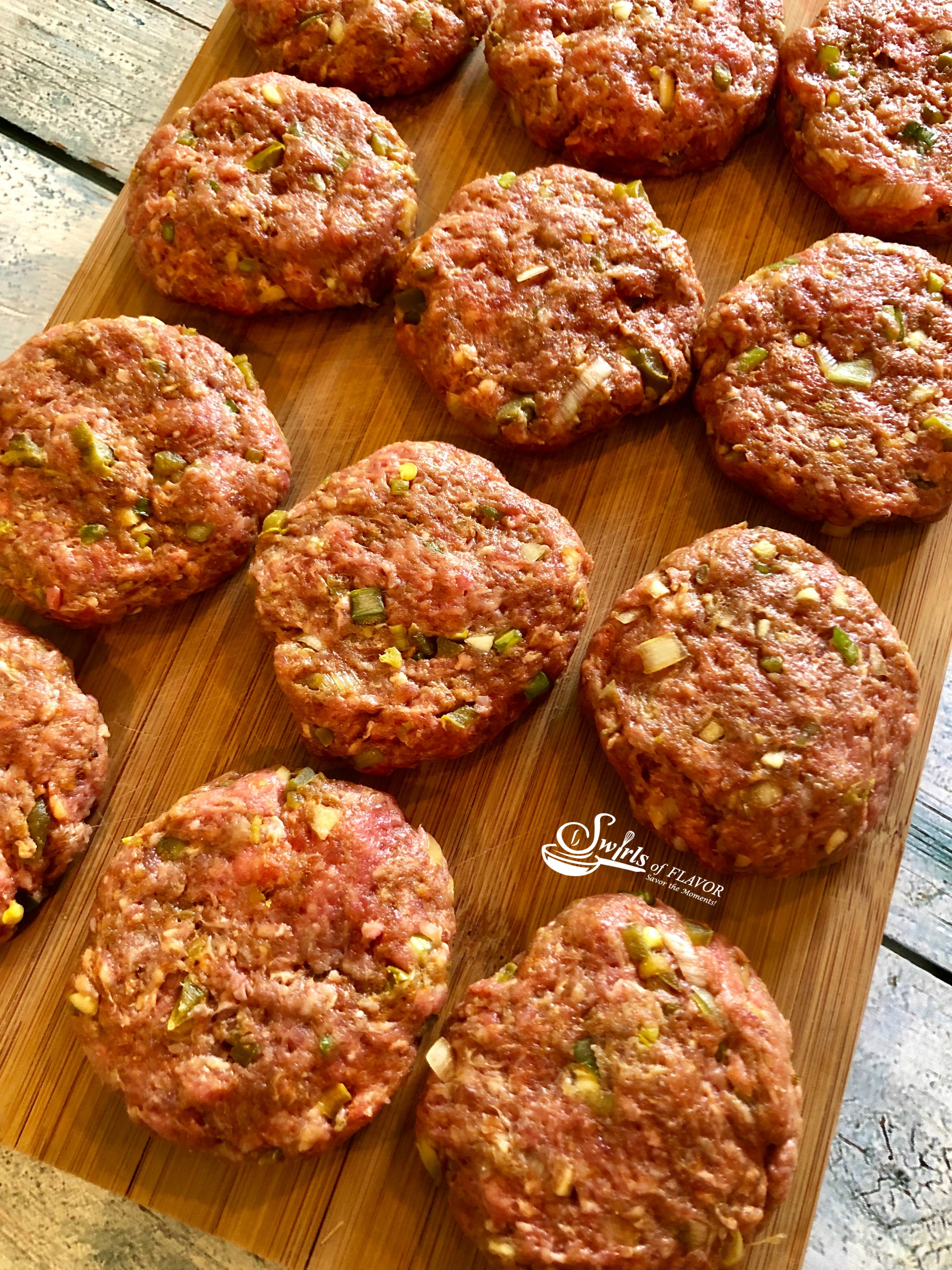 Jground beef mixture shaped into sliders for jalapeno burgers