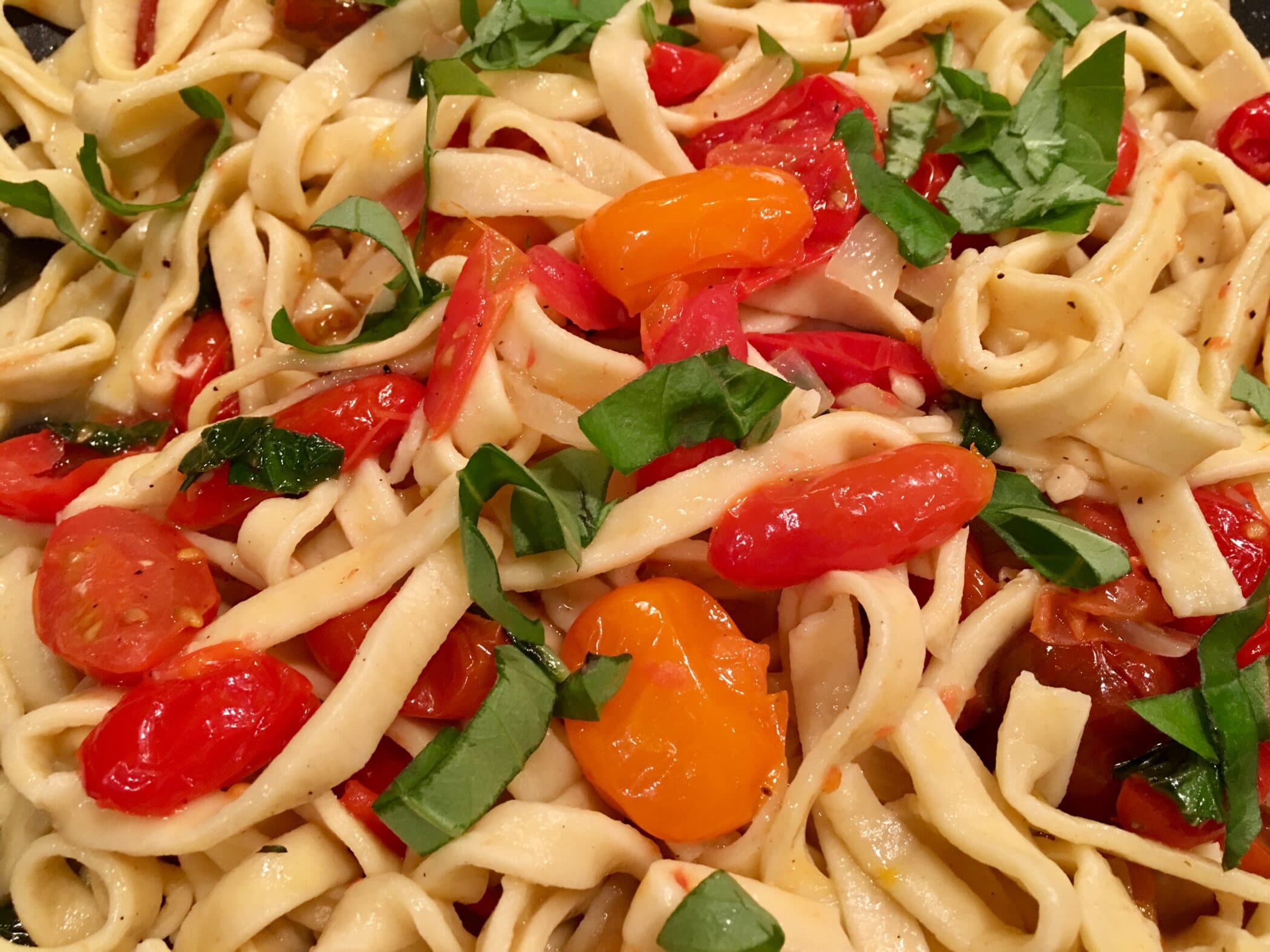 pasta with tomatoes and fresh basil
