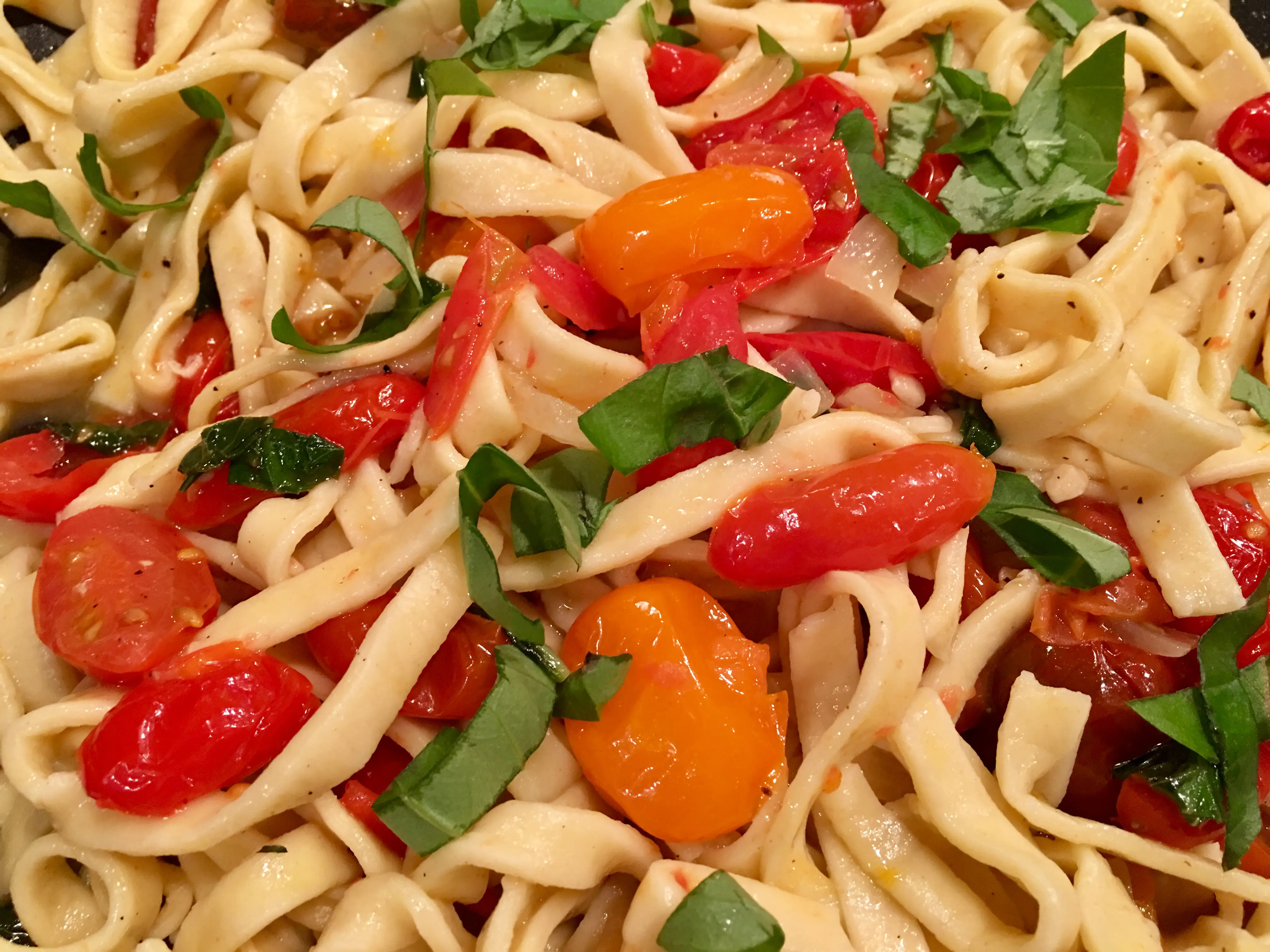 pasta with tomatoes and fresh basil