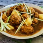 Sweet and Sour Meatballs is an easy recipe for mini meatballs flavored with fresh ginger, cilantro, scallions and garlic, shaped into mini meatballs and simmered in a homemade sweet and sour sauce.