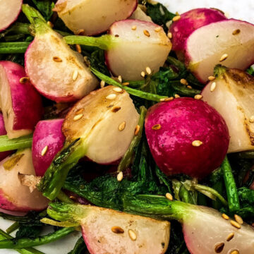 sauteed radishes with greens and sesame seeds