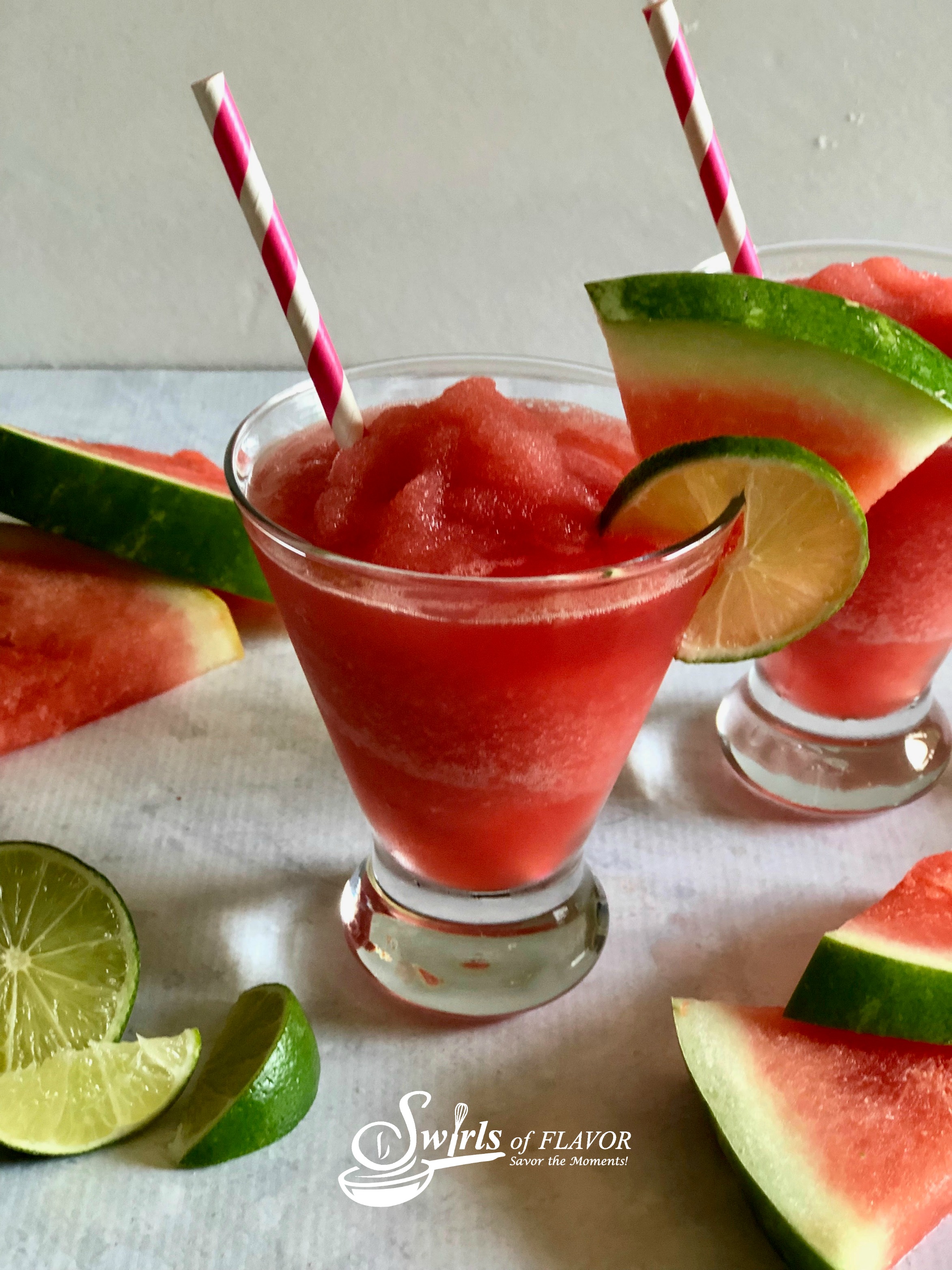 Watermelon Wine Frose with straws an lime slices