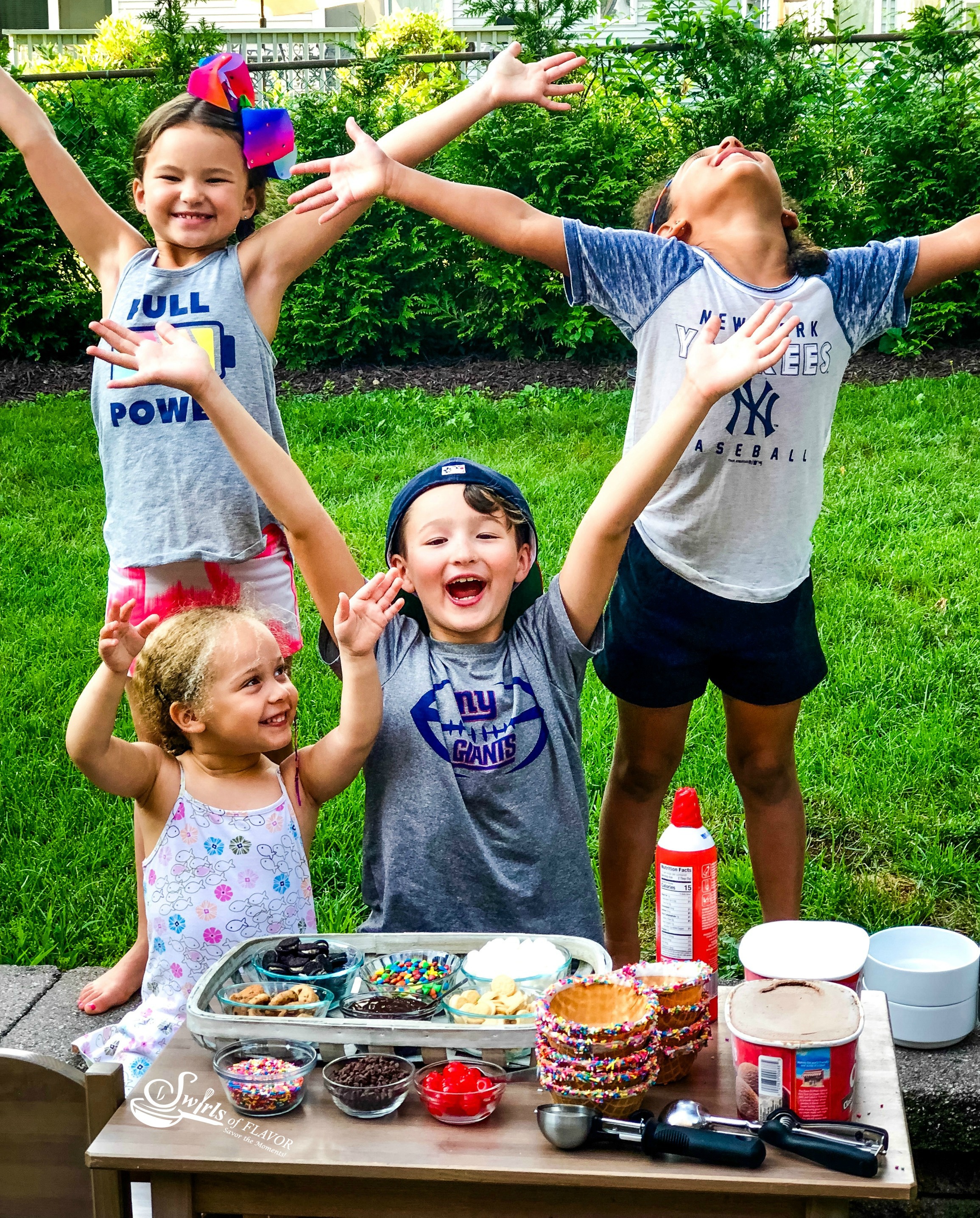 Happy kids at ice cream sundae party