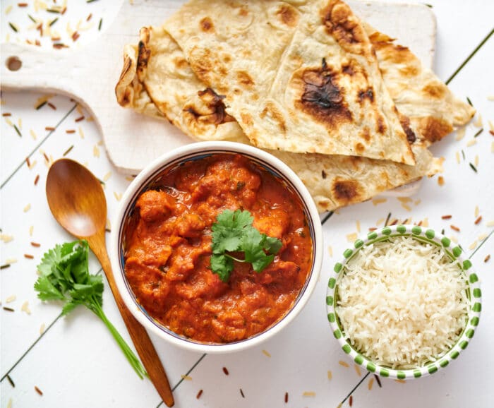 butter chicken, naan and rice