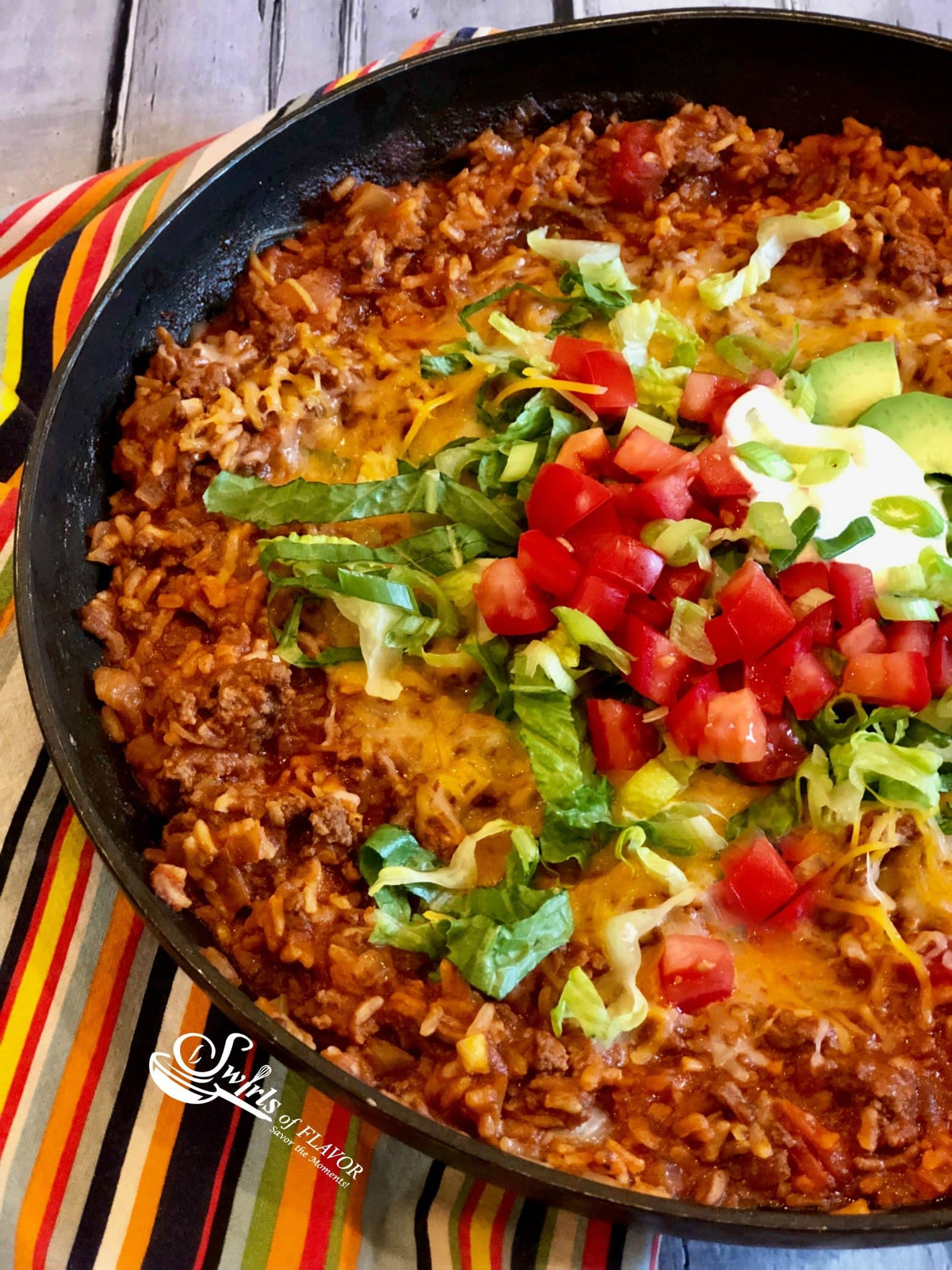 One Pot Taco Beef and Rice Swirls of Flavor