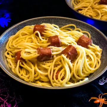 hot dogs and spaghetti in bowl