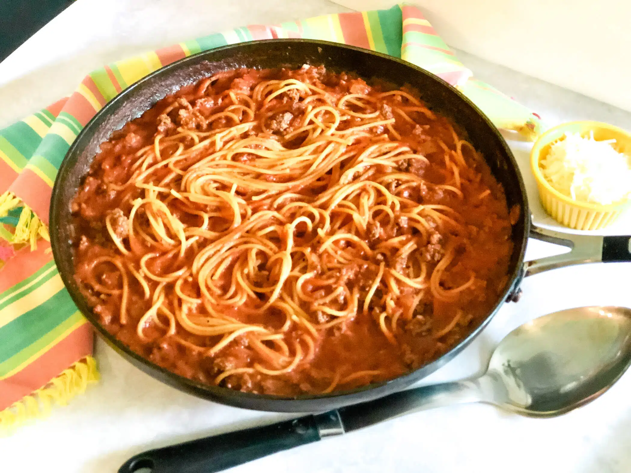 spaghetti with meat sauce in a skillet