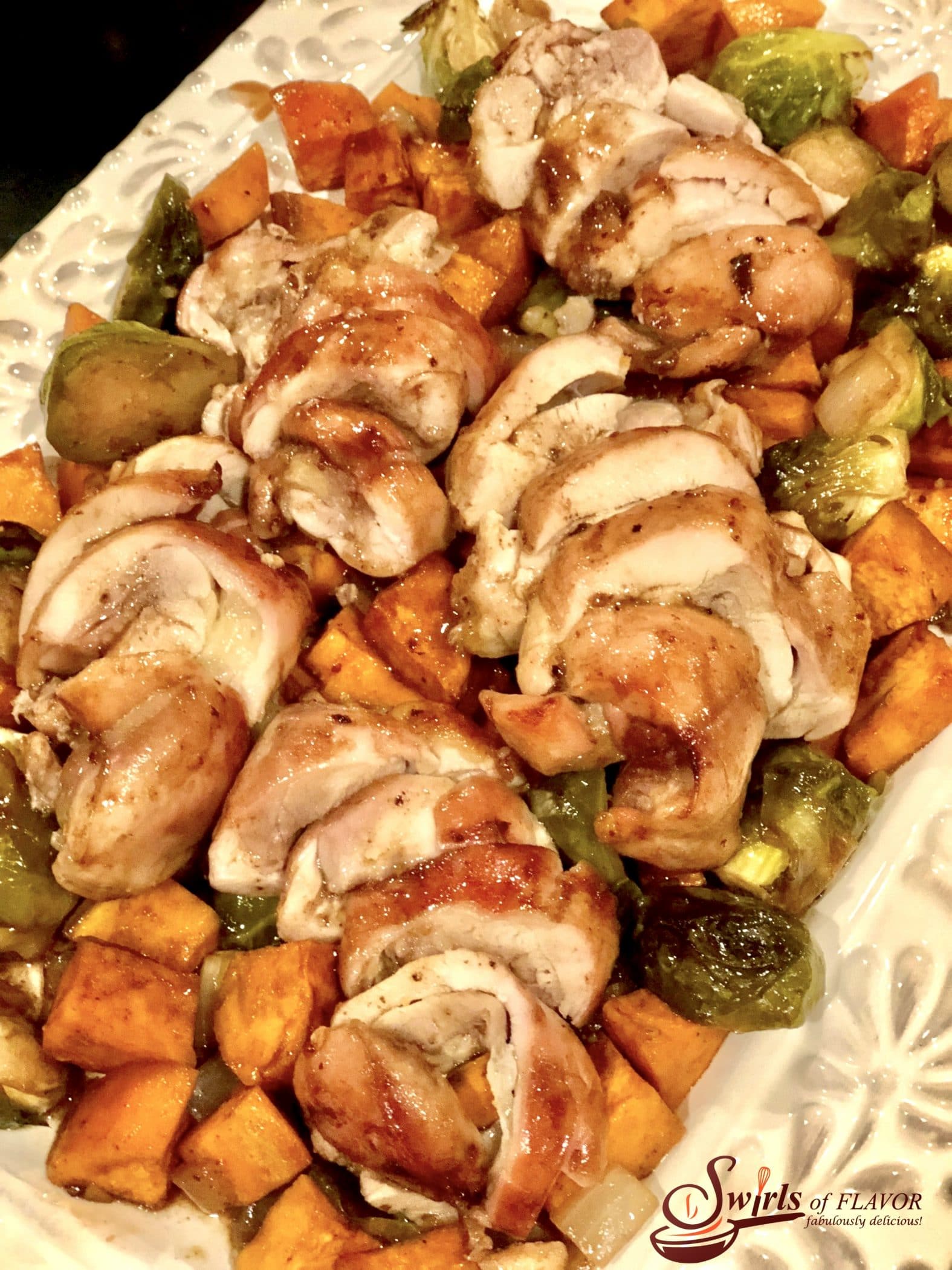 chicken with sweet potatoes and Brussels sprouts served on a platter