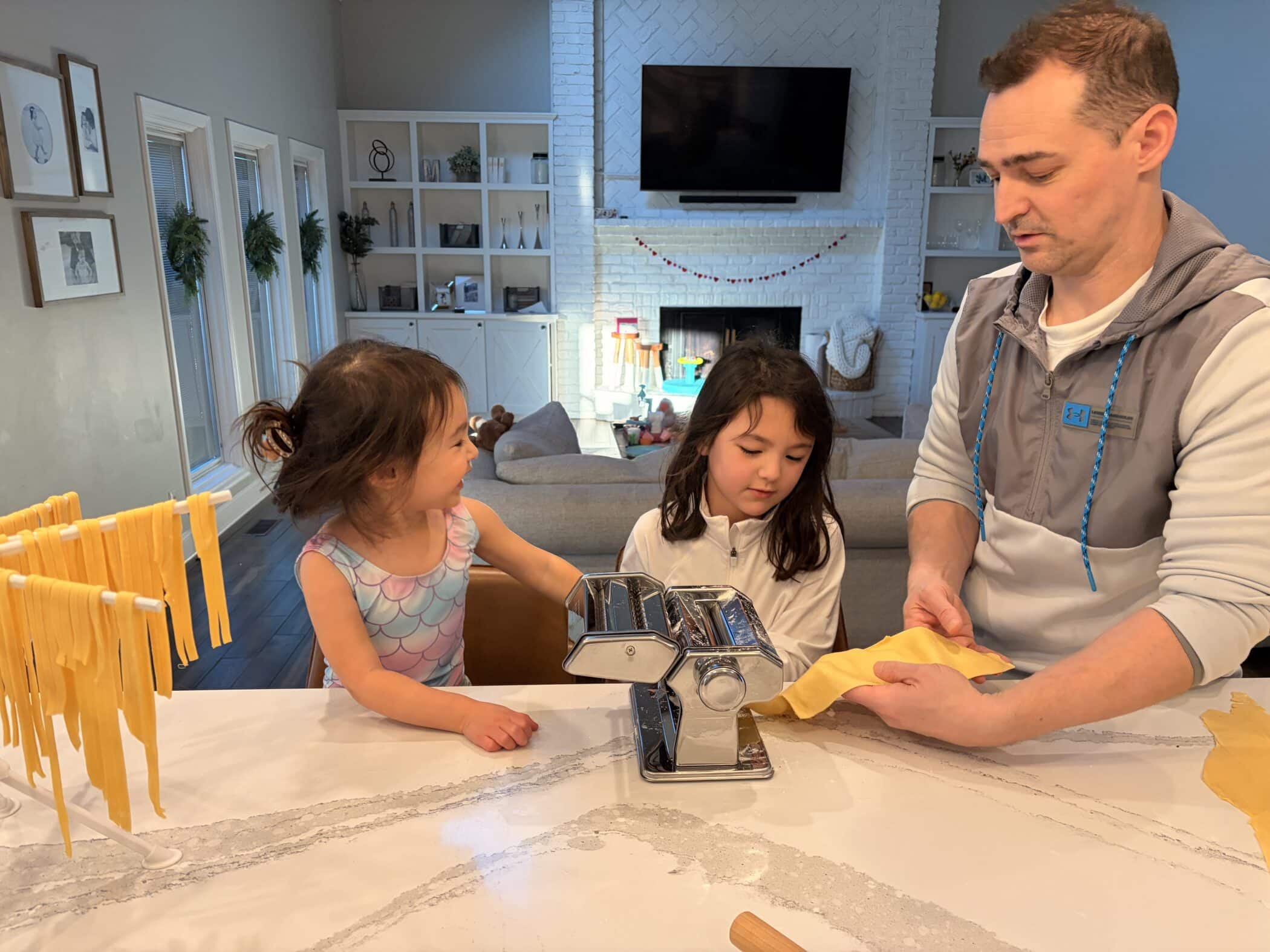 Bryan, Zoey and Mia making homemade pasta