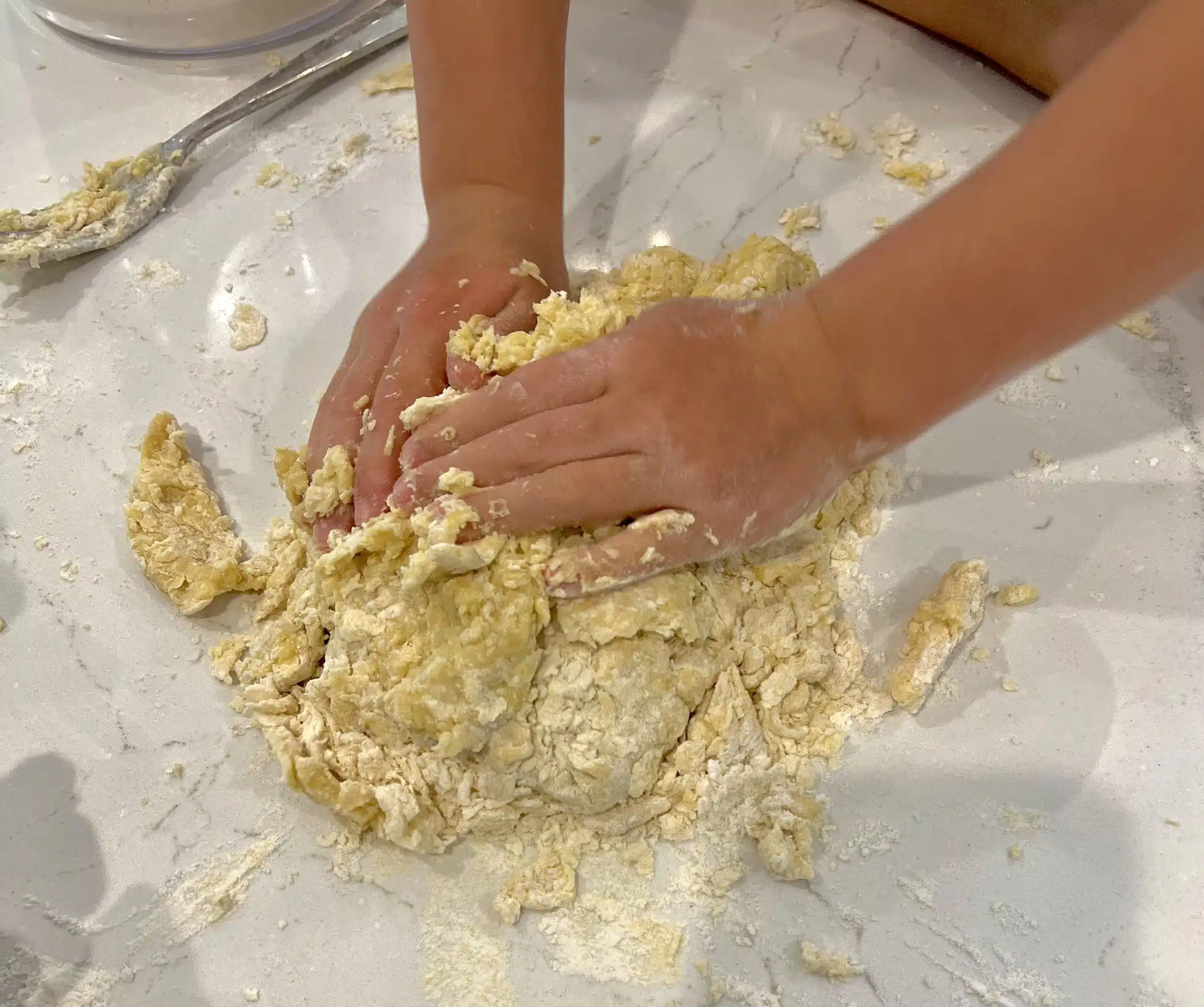 little hands making homemade pasta