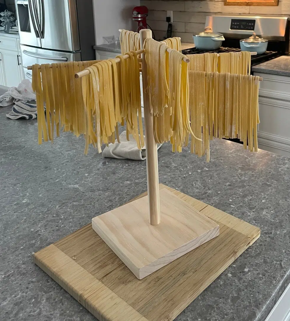 pasta drying on a rack