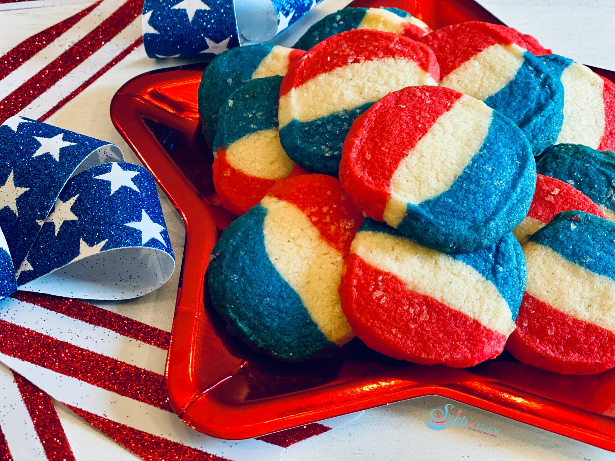Red white and blue striped cookies on a red star plate